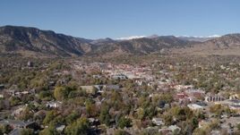 5.7K aerial stock footage descend and flyby Boulder, Colorado with mountains in background Aerial Stock Footage | DX0001_001923