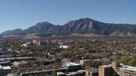 5.7K aerial stock footage flyby the University of Colorado Boulder during descent, with Green Mountain in the background Aerial Stock Footage | DX0001_001926