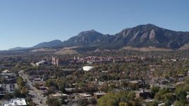 5.7K aerial stock footage ascend for view of the University of Colorado Boulder with Green Mountain in background Aerial Stock Footage | DX0001_001928