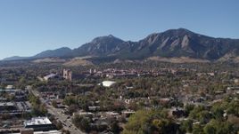 5.7K aerial stock footage pass the University of Colorado Boulder and Green Mountain in distance Aerial Stock Footage | DX0001_001932