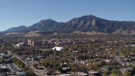 5.7K aerial stock footage approach the University of Colorado Boulder and Green Mountain in distance Aerial Stock Footage | DX0001_001933