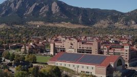 5.7K aerial stock footage flyby of part of the University of Colorado Boulder campus during ascent Aerial Stock Footage | DX0001_001940