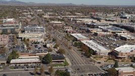 5.7K aerial stock footage of a strip mall beside a wide street in Boulder, Colorado Aerial Stock Footage | DX0001_001948