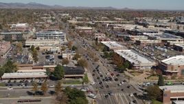 5.7K aerial stock footage fly away from cars crossing an intersection in Boulder, Colorado Aerial Stock Footage | DX0001_001951