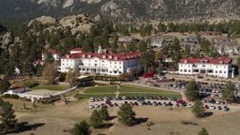 5.7K aerial stock footage of ascending with a view of the historic Stanley Hotel in Estes Park, Colorado Aerial Stock Footage | DX0001_001960