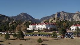 5.7K aerial stock footage fly low by the historic Stanley Hotel in Estes Park, Colorado Aerial Stock Footage | DX0001_001966