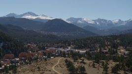 5.7K aerial stock footage of the Rocky Mountains seen from the town of Estes Park, Colorado Aerial Stock Footage | DX0001_001968