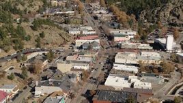 5.7K aerial stock footage of flying by shops lining the road through Estes Park, Colorado Aerial Stock Footage | DX0001_001986