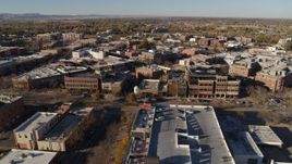 5.7K aerial stock footage of an approach to brick office buildings and shops in Fort Collins, Colorado Aerial Stock Footage | DX0001_002011