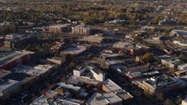 5.7K aerial stock footage of shops and office buildings in foreground near apartment buildings in Fort Collins, Colorado Aerial Stock Footage | DX0001_002052