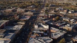 5.7K aerial stock footage of shops and office buildings around wide street in Fort Collins, Colorado Aerial Stock Footage | DX0001_002053