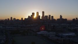 5.7K aerial stock footage flyby the city's skyline as the sun rises in Downtown Minneapolis, Minnesota Aerial Stock Footage | DX0001_002063