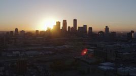 5.7K aerial stock footage flyby the city's skyline as the sun rises in Downtown Minneapolis, Minnesota Aerial Stock Footage | DX0001_002064