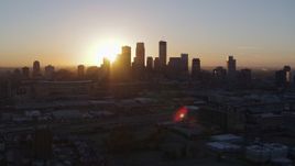 5.7K aerial stock footage flying by the city's skyline as the sun rises in Downtown Minneapolis, Minnesota Aerial Stock Footage | DX0001_002065