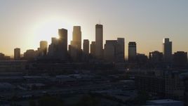 5.7K aerial stock footage focus on city skyline at sunrise during slow pass in Downtown Minneapolis, Minnesota Aerial Stock Footage | DX0001_002076