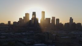 5.7K aerial stock footage ascend and fly away from city skyline at sunrise in Downtown Minneapolis, Minnesota Aerial Stock Footage | DX0001_002078