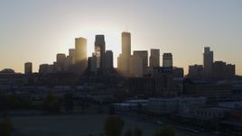 5.7K aerial stock footage descend and flyby the city's skyline at sunrise in Downtown Minneapolis, Minnesota Aerial Stock Footage | DX0001_002084