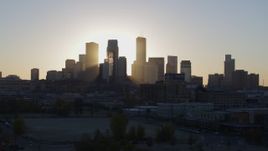 5.7K aerial stock footage flyby the city's skyline at sunrise in Downtown Minneapolis, Minnesota Aerial Stock Footage | DX0001_002085