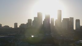 5.7K aerial stock footage passing by the city's skyline at sunrise in Downtown Minneapolis, Minnesota Aerial Stock Footage | DX0001_002086