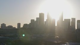 5.7K aerial stock footage descend and flyby the city's skyline at sunrise in Downtown Minneapolis, Minnesota Aerial Stock Footage | DX0001_002087