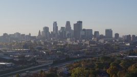 5.7K aerial stock footage slowly flying by the city's downtown skyline during descent at sunrise in Downtown Minneapolis, Minnesota Aerial Stock Footage | DX0001_002092