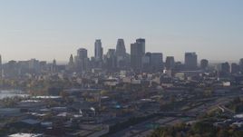 5.7K aerial stock footage slowly pass the city's downtown skyline at sunrise in Downtown Minneapolis, Minnesota Aerial Stock Footage | DX0001_002096