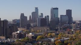 5.7K aerial stock footage of skyscrapers in city's skyline during ascent at sunrise in Downtown Minneapolis, Minnesota Aerial Stock Footage | DX0001_002105
