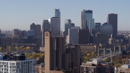 5.7K aerial stock footage of city's skyline seen from condo complex, reveal apartments at sunrise in Downtown Minneapolis, Minnesota Aerial Stock Footage | DX0001_002107