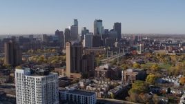 5.7K aerial stock footage of a view of the skyscrapers in the city's skyline at sunrise in Downtown Minneapolis, Minnesota Aerial Stock Footage | DX0001_002113