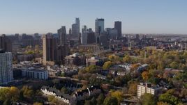 5.7K aerial stock footage of city's skyline seen from an apartment building at sunrise in Downtown Minneapolis, Minnesota Aerial Stock Footage | DX0001_002116