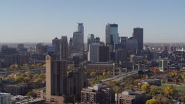 5.7K aerial stock footage ascend and flyby a view of skyline seen from residential area in Downtown Minneapolis, Minnesota Aerial Stock Footage | DX0001_002125