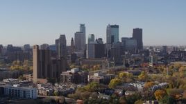 5.7K aerial stock footage the downtown skyline seen while ascending at sunrise in Downtown Minneapolis, Minnesota Aerial Stock Footage | DX0001_002128
