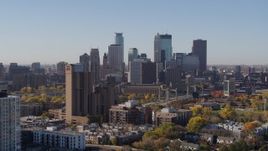 5.7K aerial stock footage the downtown skyline seen from residential buildings at sunrise in Downtown Minneapolis, Minnesota Aerial Stock Footage | DX0001_002129