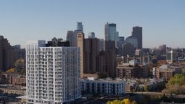 5.7K aerial stock footage the downtown skyline seen from residential buildings at sunrise in Downtown Minneapolis, Minnesota Aerial Stock Footage | DX0001_002131