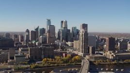 5.7K aerial stock footage slowly flying by the skyline, seen from the river in Downtown Minneapolis, Minnesota Aerial Stock Footage | DX0001_002135