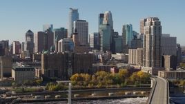 5.7K aerial stock footage pass by the skyline on the other side of the Mississippi River, Downtown Minneapolis, Minnesota Aerial Stock Footage | DX0001_002151