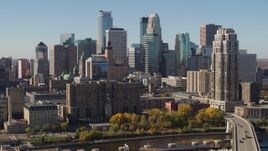 5.7K aerial stock footage passing by the city's skyline, seen from opposite side of the river, Downtown Minneapolis, Minnesota Aerial Stock Footage | DX0001_002154