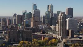 5.7K aerial stock footage ascend by the city's skyline, seen from opposite side of the river, Downtown Minneapolis, Minnesota Aerial Stock Footage | DX0001_002155