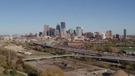 5.7K aerial stock footage reverse view of I-394 freeway and the skyline of Downtown Minneapolis, Minnesota Aerial Stock Footage | DX0001_002168