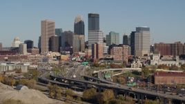 5.7K aerial stock footage of passing the I-394 freeway and the city skyline, Downtown Minneapolis, Minnesota Aerial Stock Footage | DX0001_002178