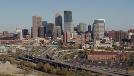 5.7K aerial stock footage flyby the freeway and then approach the city skyline, Downtown Minneapolis, Minnesota Aerial Stock Footage | DX0001_002181