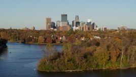 5.7K aerial stock footage a view of the city's skyline seen from Lake of the Isles, Downtown Minneapolis, Minnesota Aerial Stock Footage | DX0001_002197