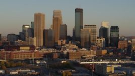 5.7K aerial stock footage of a view of the city's downtown skyline at sunset in Downtown Minneapolis, Minnesota Aerial Stock Footage | DX0001_002224