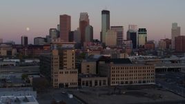 5.7K aerial stock footage the city's skyline at sunset seen from marketplace, Downtown Minneapolis, Minnesota Aerial Stock Footage | DX0001_002244
