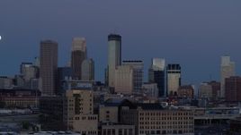 5.7K aerial stock footage flyby the city's skyline with the moon in the sky at twilight, reveal market, Downtown Minneapolis, Minnesota Aerial Stock Footage | DX0001_002266