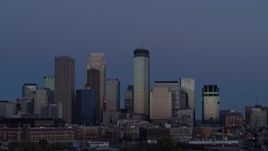 5.7K aerial stock footage a view of skyscrapers in city skyline at twilight during ascent, Downtown Minneapolis, Minnesota Aerial Stock Footage | DX0001_002268