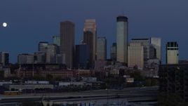 5.7K aerial stock footage a view of skyscrapers in city skyline at twilight during descent, Downtown Minneapolis, Minnesota Aerial Stock Footage | DX0001_002269