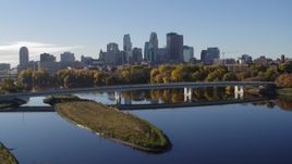5.7K aerial stock footage a view of the city's skyline seen from the Mississippi River, Downtown Minneapolis, Minnesota Aerial Stock Footage | DX0001_002342