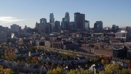 5.7K aerial stock footage stationary view of the city skyline before flying away, Downtown Minneapolis, Minnesota Aerial Stock Footage | DX0001_002344