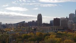 5.7K aerial stock footage of The Carlyle skyscraper and Hennepin Avenue Bridge, Downtown Minneapolis, Minnesota Aerial Stock Footage | DX0001_002375